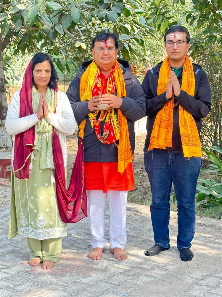 The Saini family offering worship